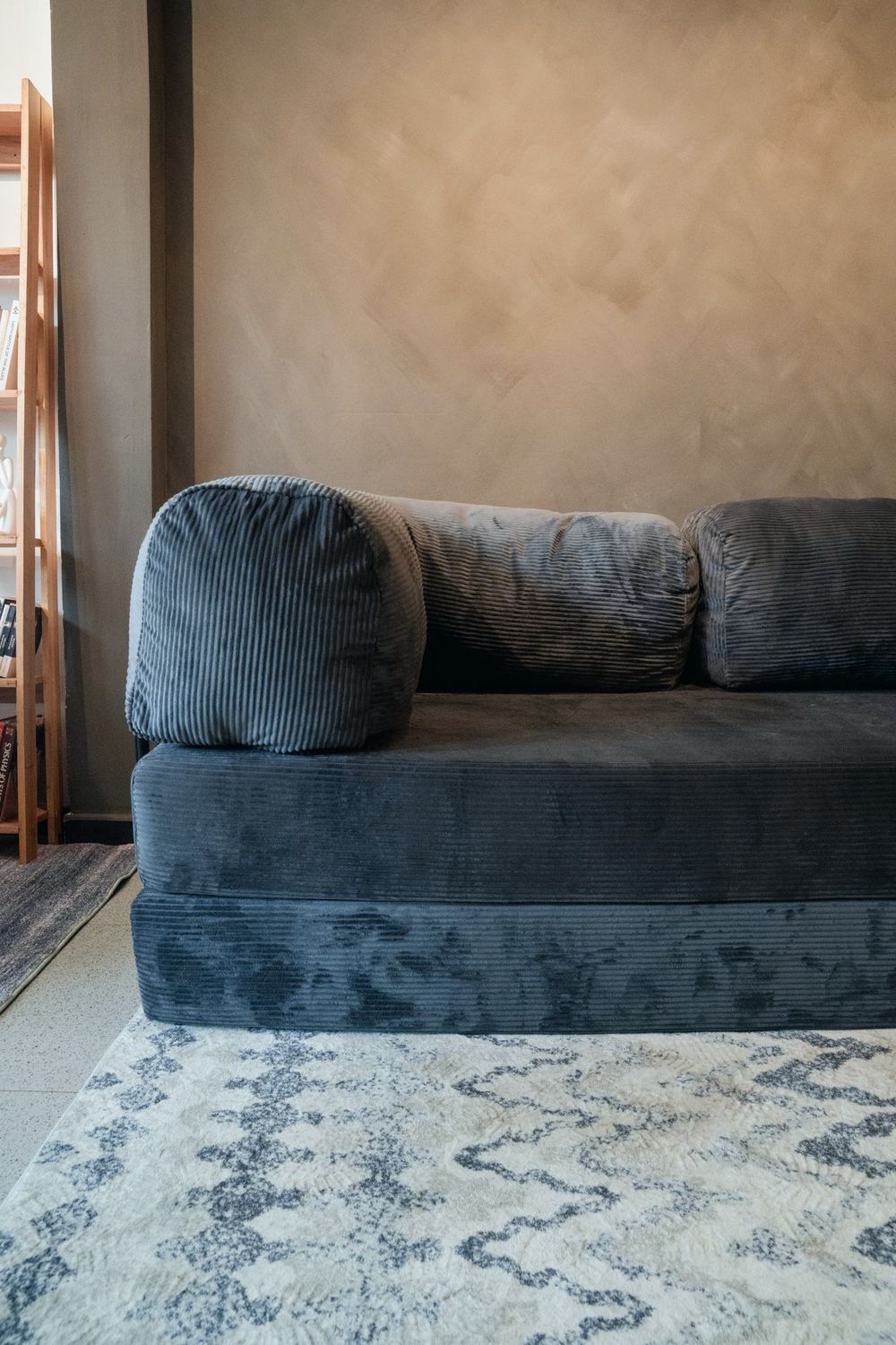 The long arm of the Cloud Corner, cushions stacked into the return.