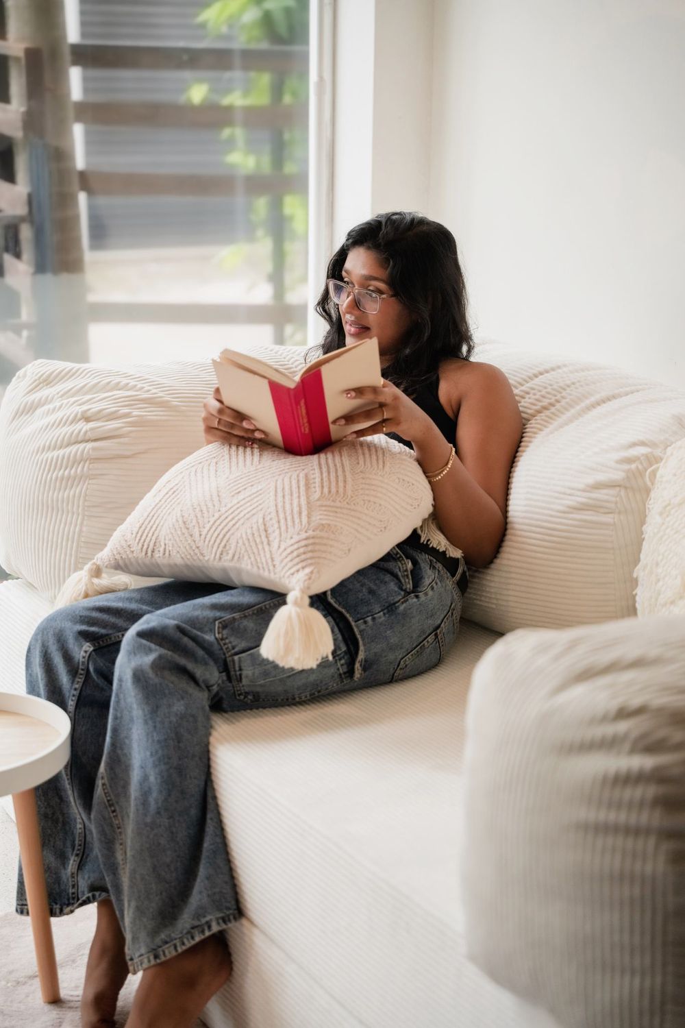 The Cloud Sofa folded down into its lounge bed, blankets gathered at one end.